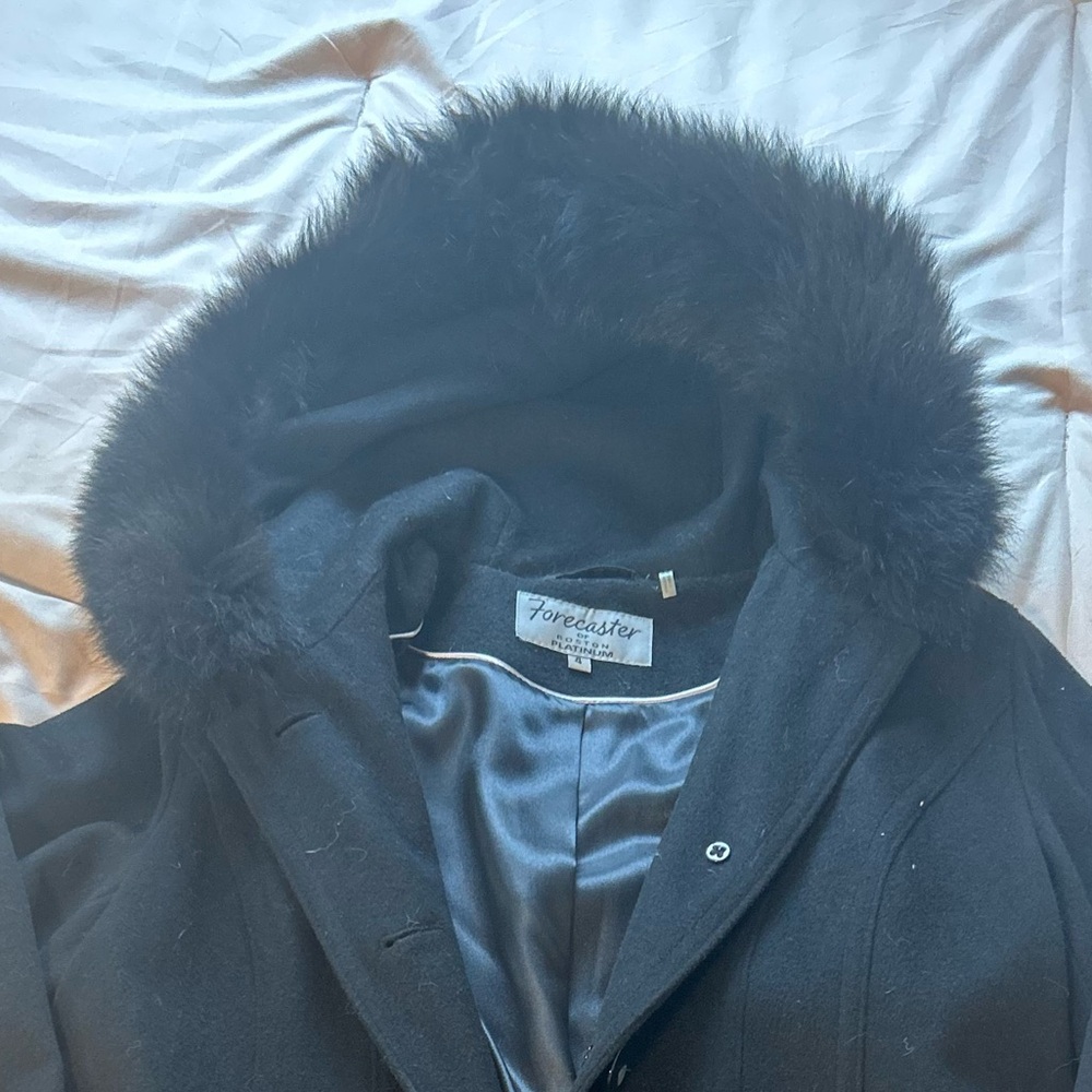 Wool coat with faux fur lined hood